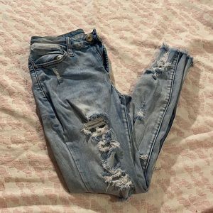 Rue 21 distressed light wash jeans.